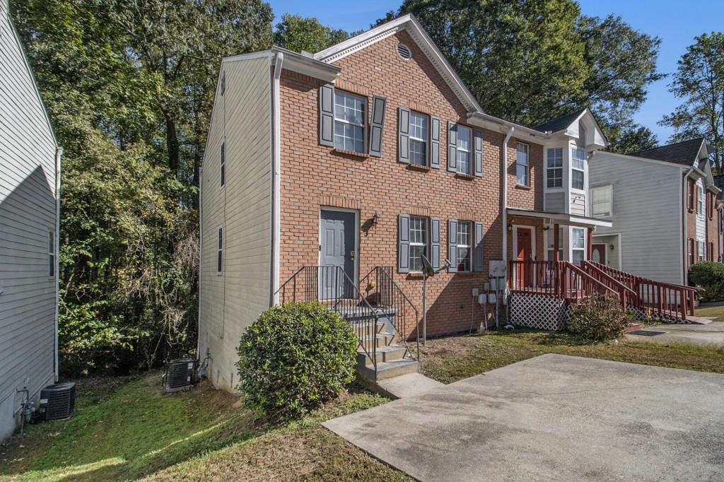 6510 Charter Way Lithonia, GA 30058 - Photo 24 of 27 a front view of a house with garden