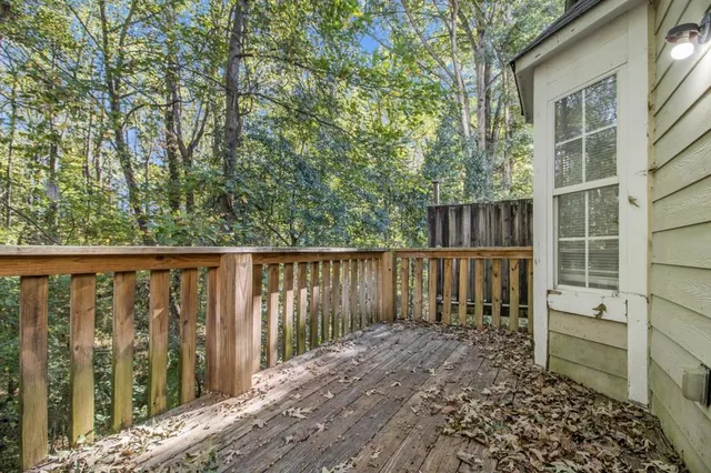 a balcony with wooden floor