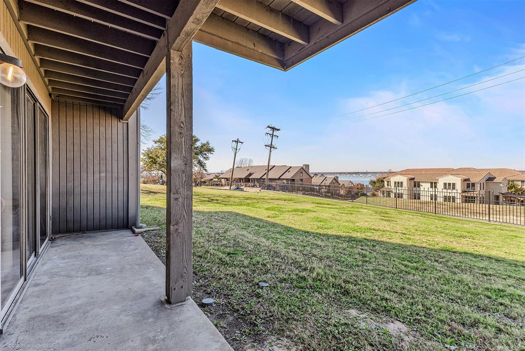 925 Signal Ridge Place Rockwall, TX 75032 - Photo 21 of 21 a view of a backyard with ocean