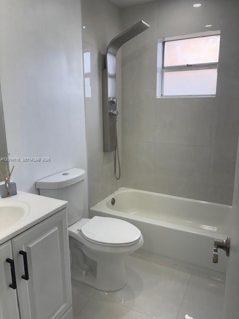 12328 Southwest 259th Street Homestead, FL 33032 - Photo 12 of 18 a bathroom with a toilet a sink and bathtub