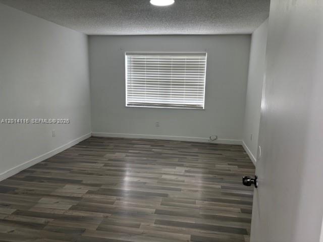 12328 Southwest 259th Street Homestead, FL 33032 - Photo 10 of 18 a view of a room with wooden floor and window