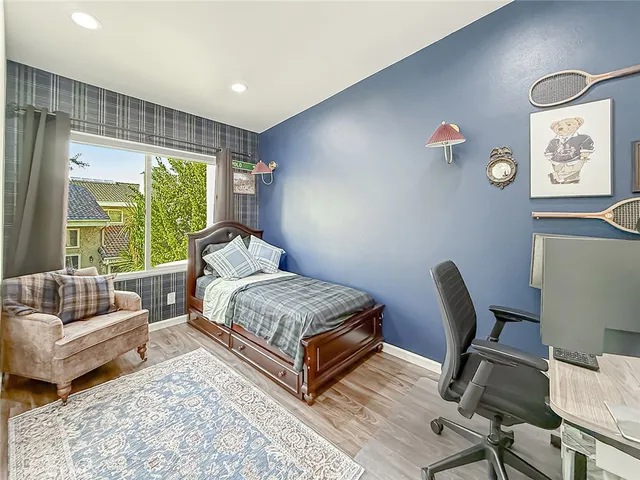 a bed room with a bed and a couch