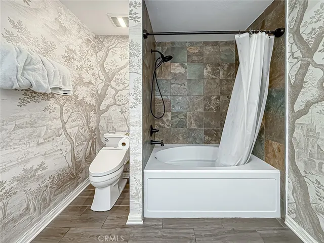 a view of a bathtub in a bathroom