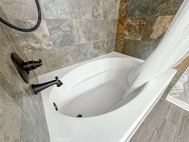 a view of yard with patio