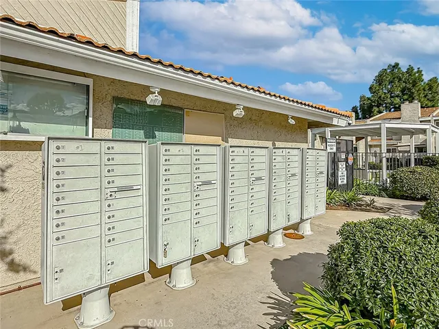 a view of a house with a street