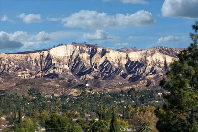 an aerial view of residential house and green space