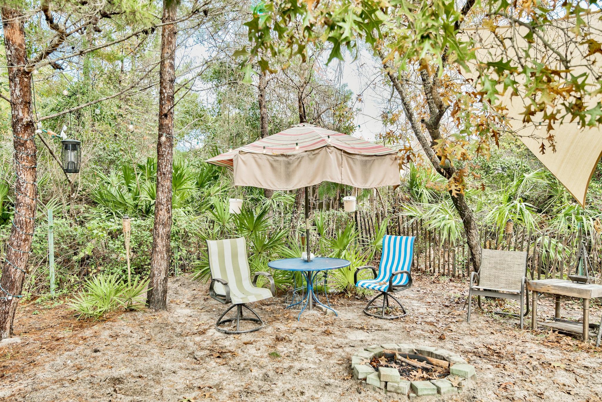 91 Walnut Street Santa Rosa Beach, FL 32459 - Photo 27 of 39 a garden view with a seating space