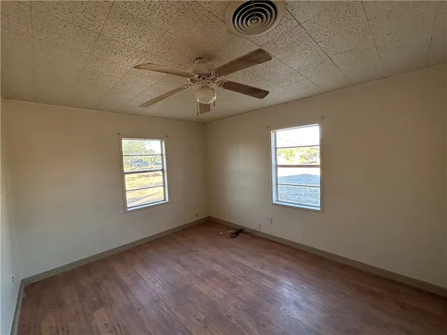 a view of an empty room and window