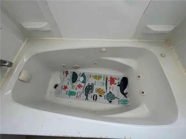 a utility room with lots of painting on the wall