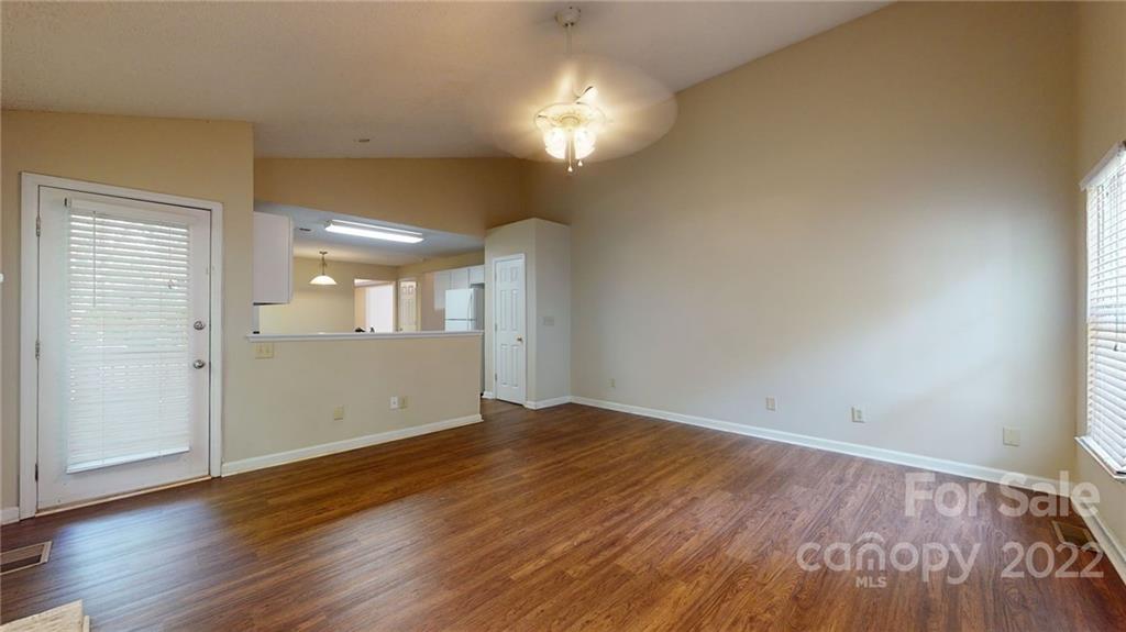 6401 Mounting Rock Road Charlotte, NC 28217 - Photo 16 of 35 a view of empty room with wooden floor