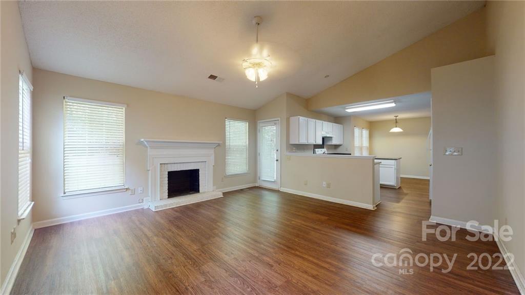 6401 Mounting Rock Road Charlotte, NC 28217 - Photo 17 of 35 a view of a kitchen with wooden floor and a kitchen