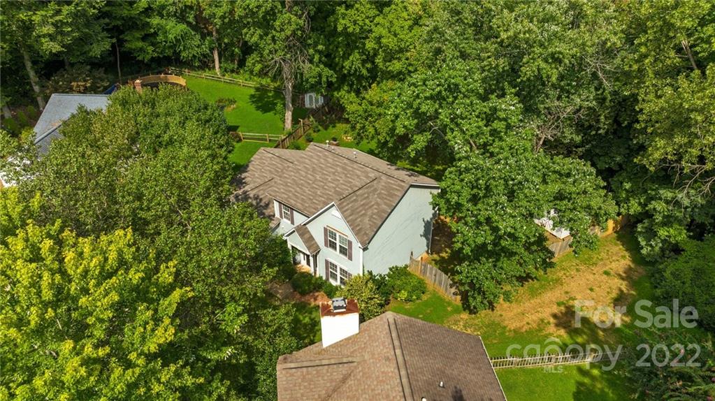 6401 Mounting Rock Road Charlotte, NC 28217 - Photo 33 of 35 a view of a house with a yard
