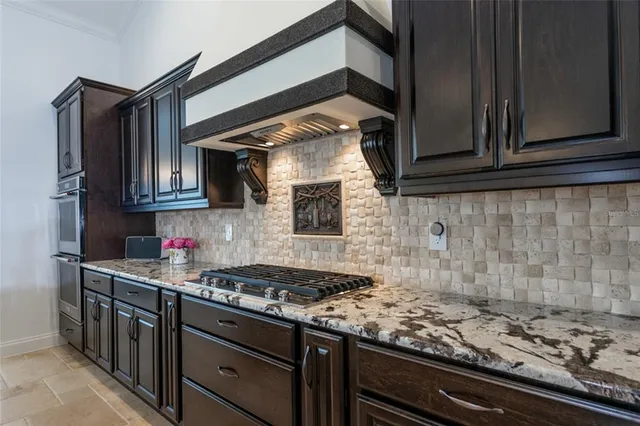 a view of a ocean with boats and trees in the background