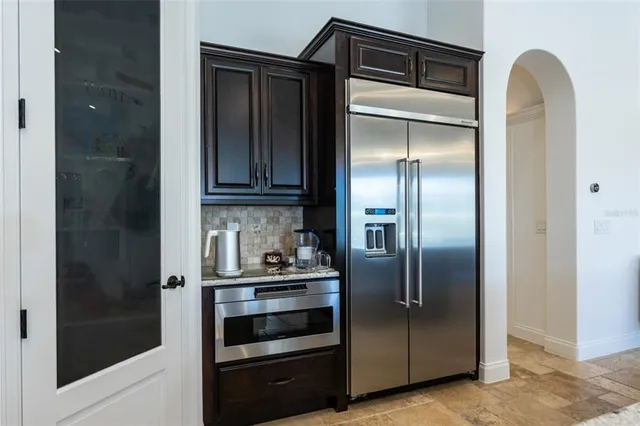 a view of storage and utility room with washer and dryer