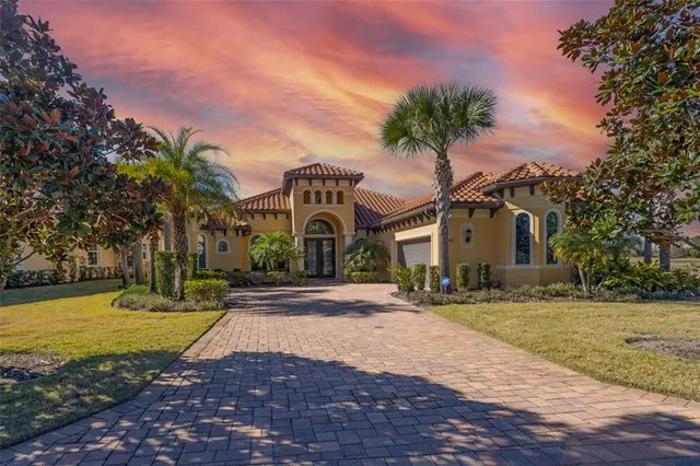 a living room with fireplace furniture and a flat screen tv