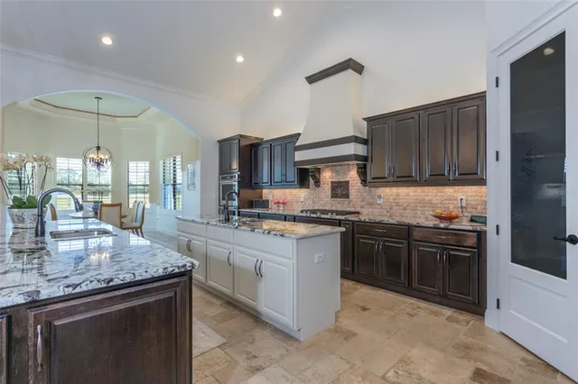 a bathroom with a double vanity sink mirror and double