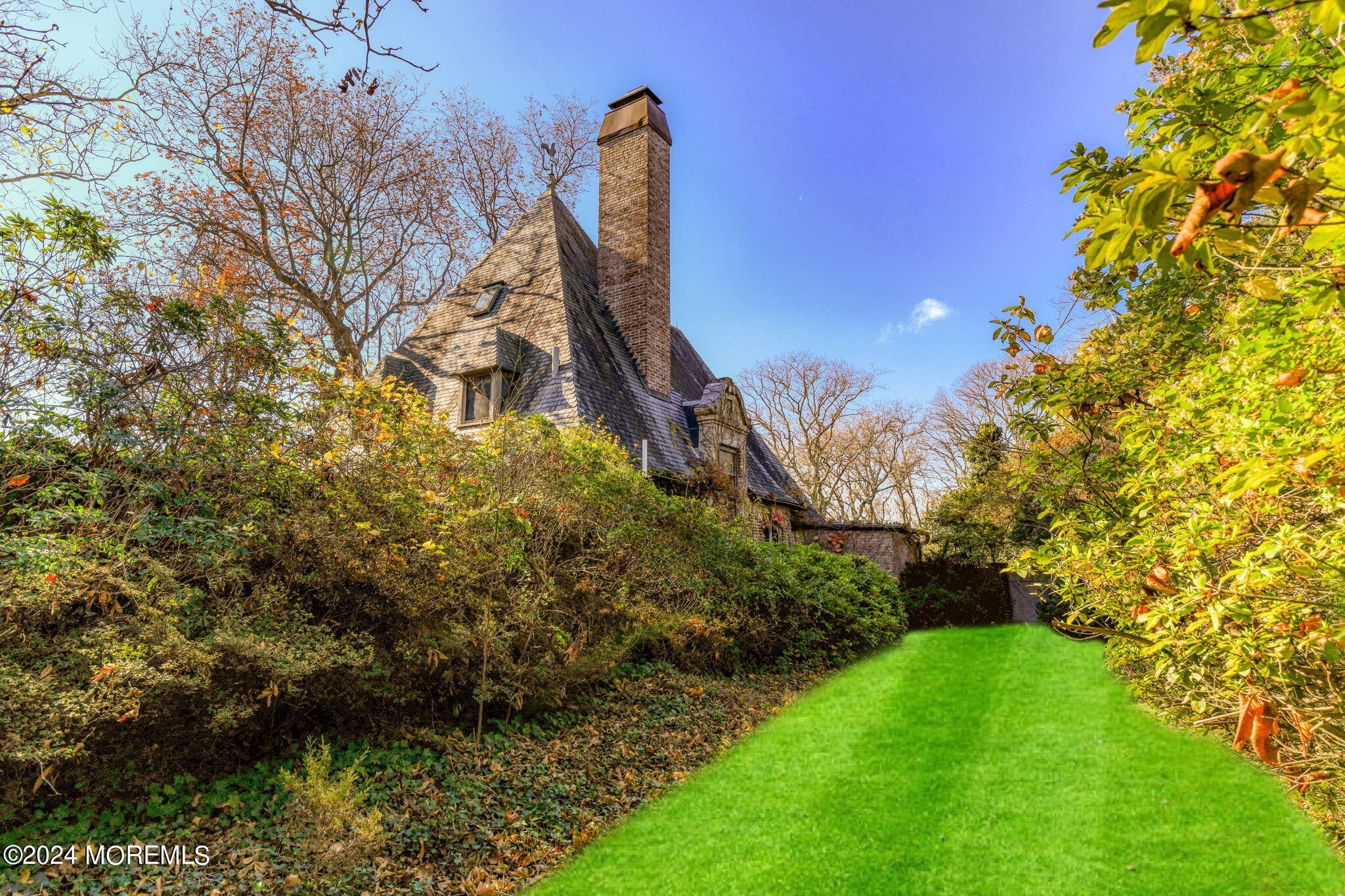 799 Navesink River Road Rumson, NJ 07760 - Photo 21 of 59 a view of a garden with large trees