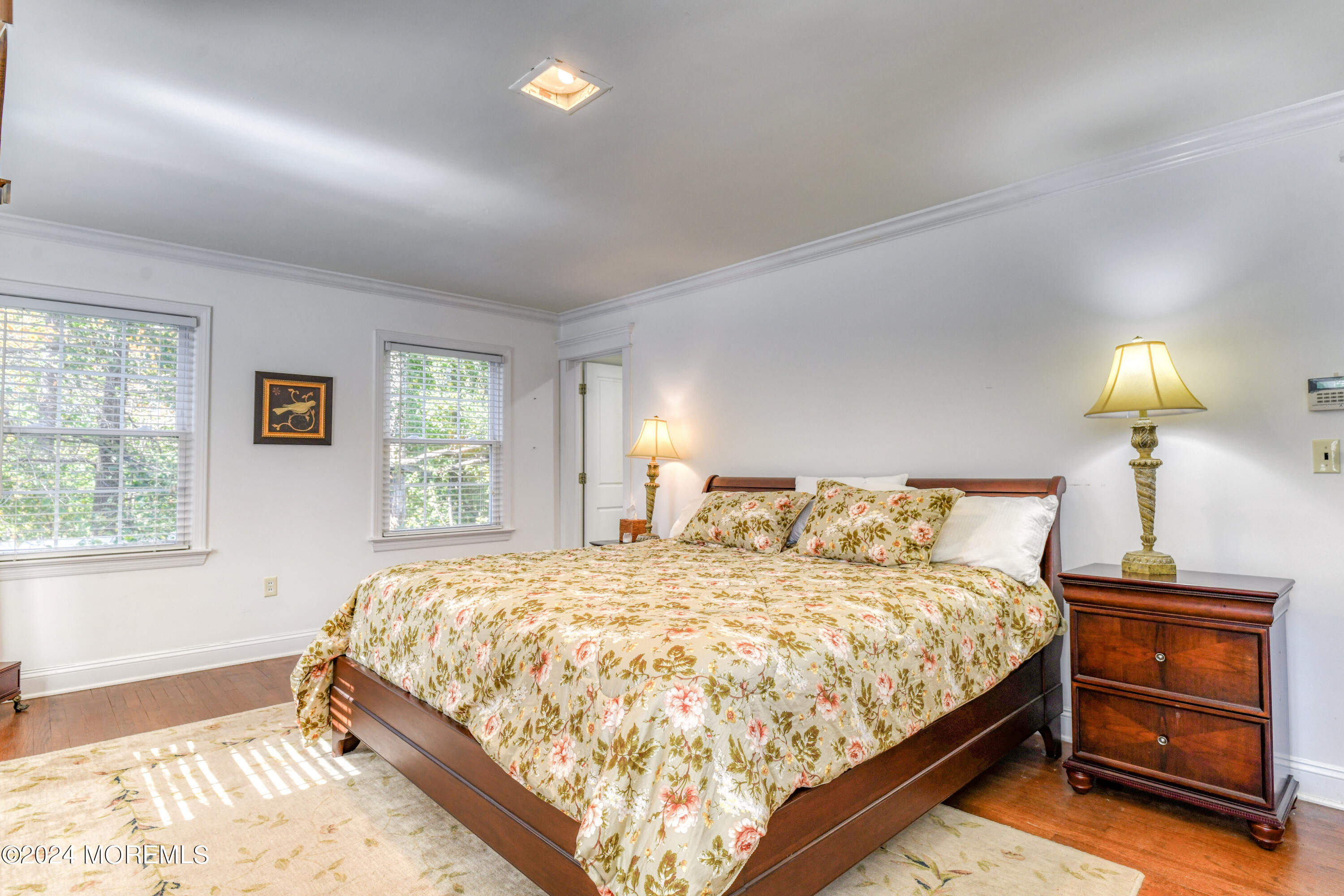 799 Navesink River Road Rumson, NJ 07760 - Photo 34 of 59 a bedroom with a bed and a window