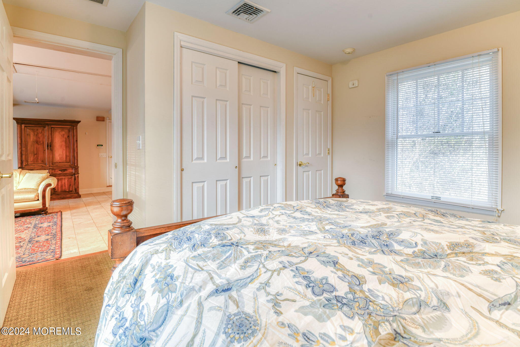 799 Navesink River Road Rumson, NJ 07760 - Photo 40 of 59 a bedroom with a bed and a window