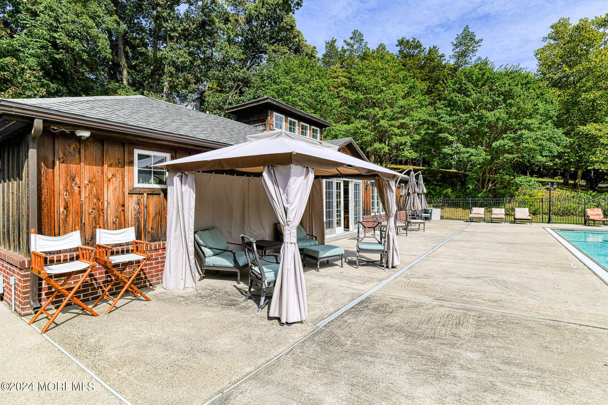 799 Navesink River Road Rumson, NJ 07760 - Photo 47 of 59 a view of backyard with deck and seating area