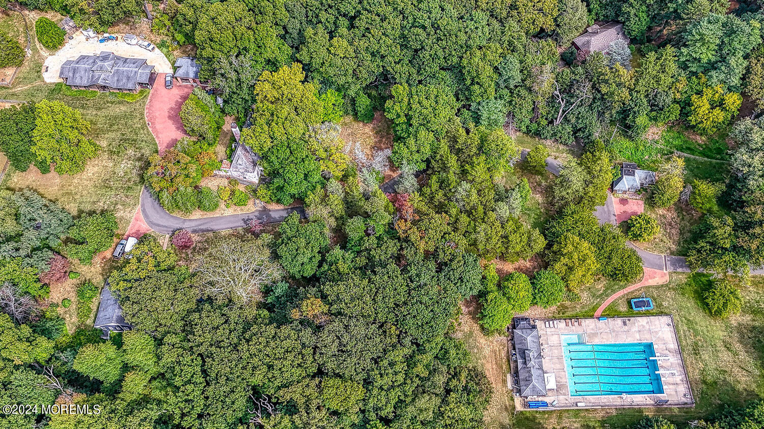 799 Navesink River Road Rumson, NJ 07760 - Photo 53 of 59 an aerial view of a house with a yard and garden