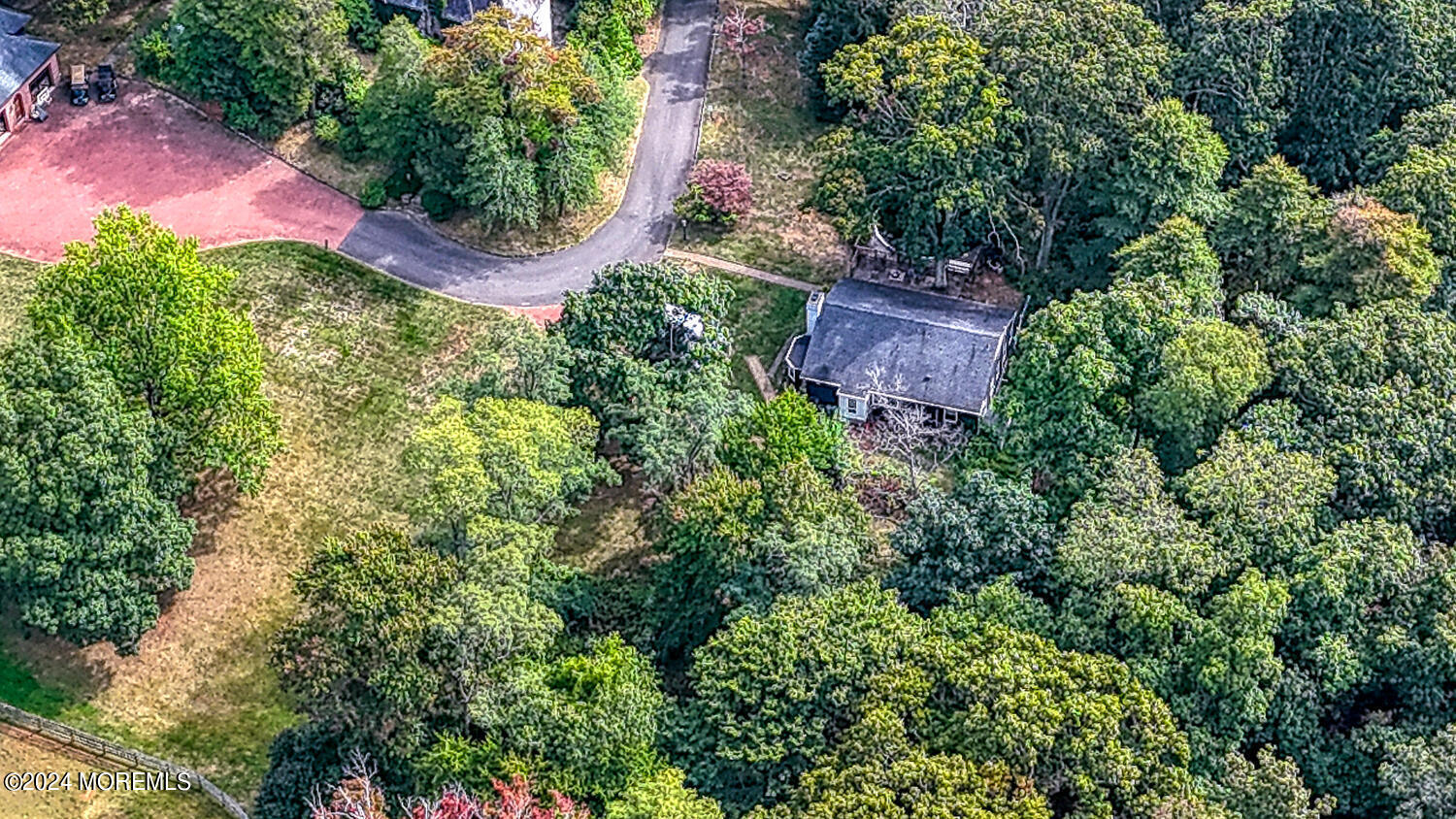 799 Navesink River Road Rumson, NJ 07760 - Photo 55 of 59 an aerial view of a house with a yard