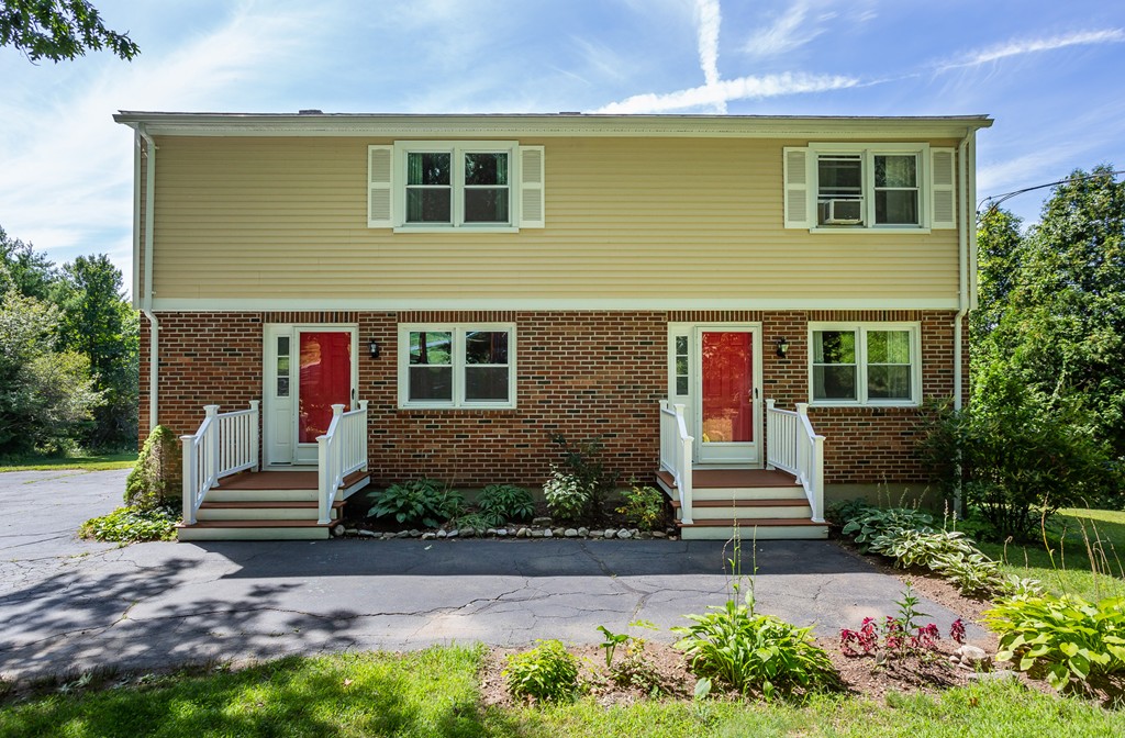 24 North Farms Road Williamsburg, MA 01039 - Photo 1 of 40 front view of a house with a yard
