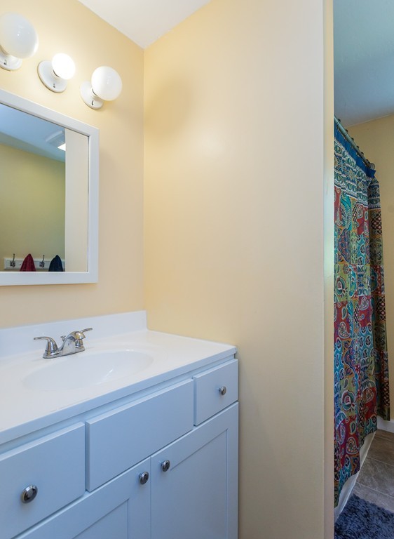 24 North Farms Road Williamsburg, MA 01039 - Photo 39 of 40 a bathroom with a sink and a mirror