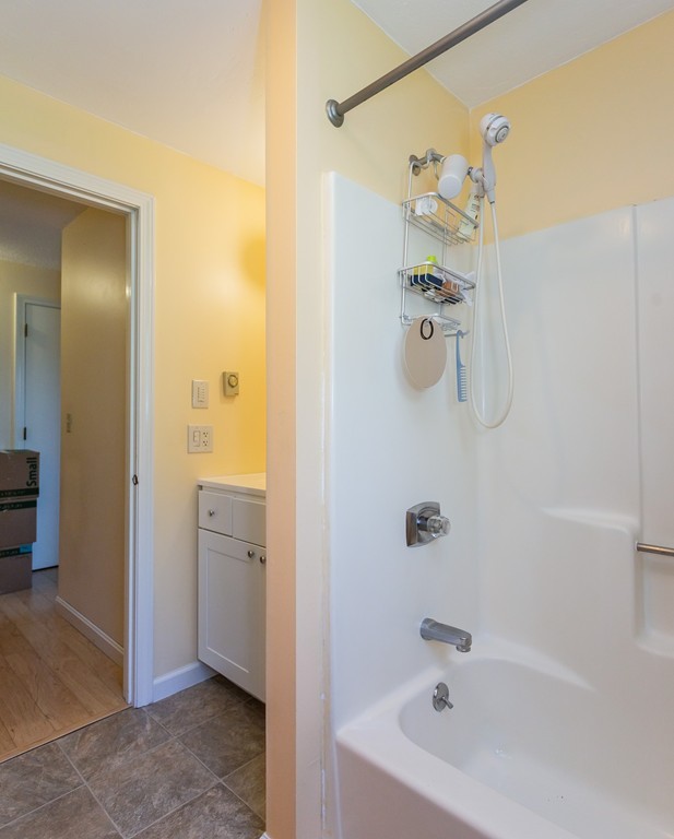 24 North Farms Road Williamsburg, MA 01039 - Photo 40 of 40 a bathroom with a bathtub