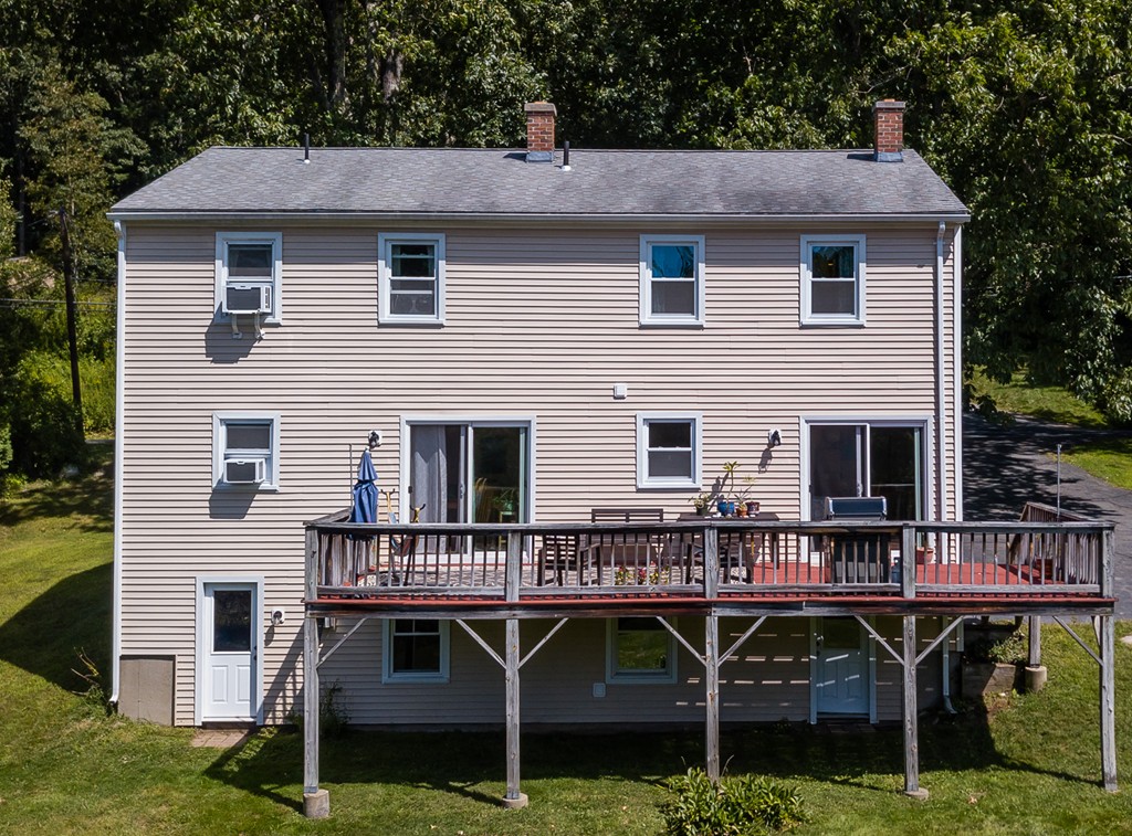 24 North Farms Road Williamsburg, MA 01039 - Photo 5 of 40 a view of a house with roof deck