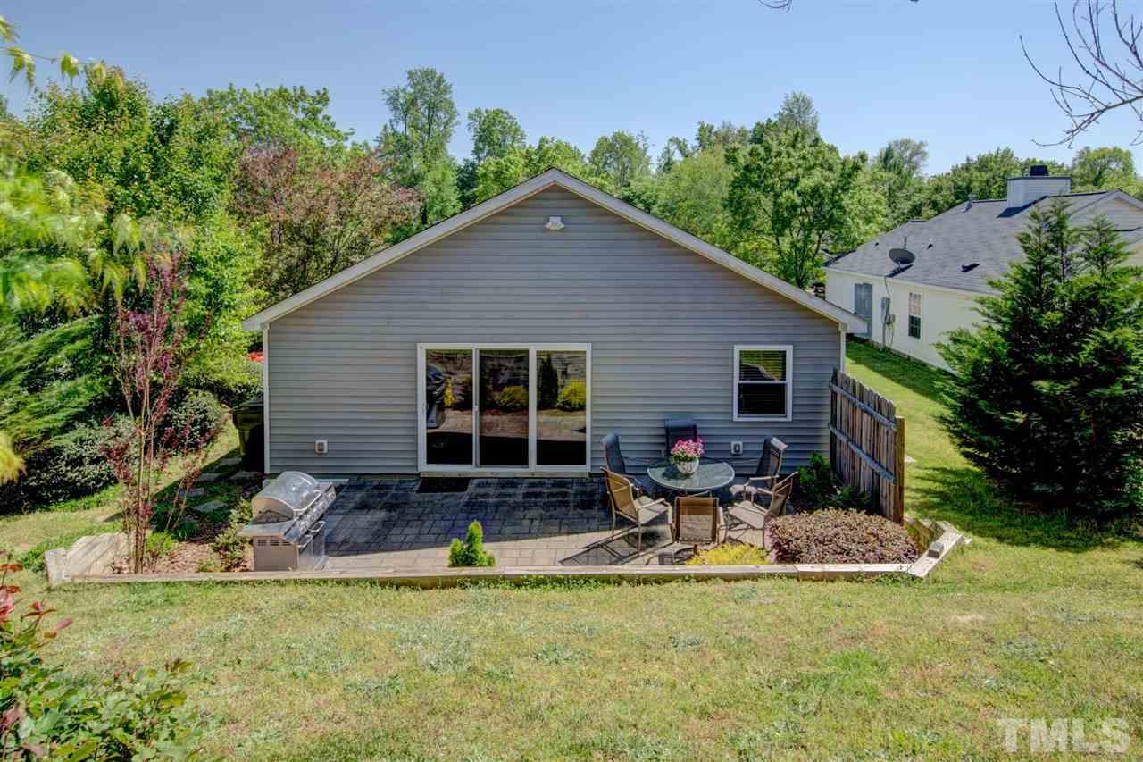 4845 Silverdene Street Raleigh, NC 27616 - Photo 2 of 24 a view of a house with backyard and sitting area