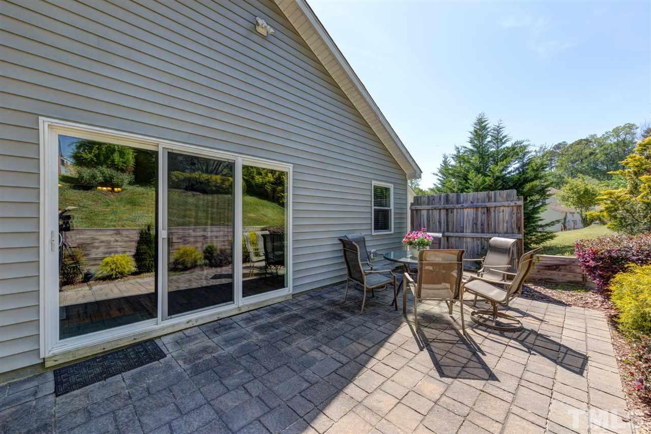 4845 Silverdene Street Raleigh, NC 27616 - Photo 20 of 24 a view of a house with backyard and sitting area