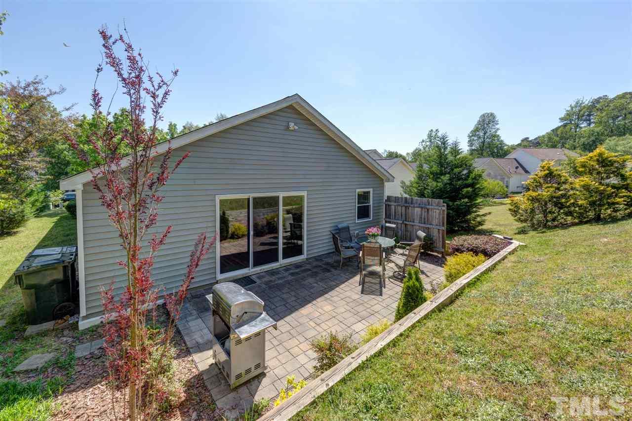 4845 Silverdene Street Raleigh, NC 27616 - Photo 22 of 24 a view of a house with backyard and sitting area
