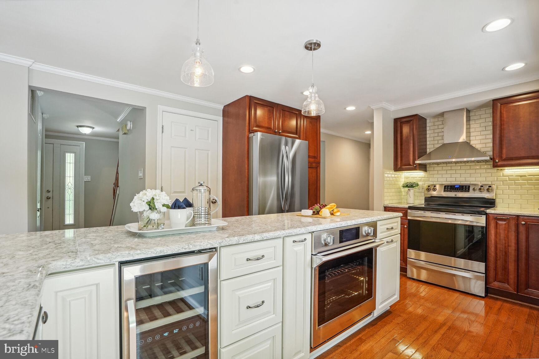 7586 Vogels Way Springfield, VA 22153 - Photo 13 of 42 Wine fridge and wall oven