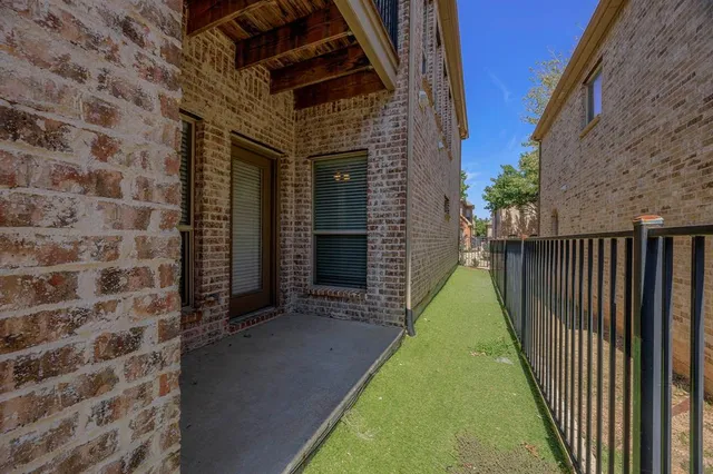 a front view of a house with an empty space