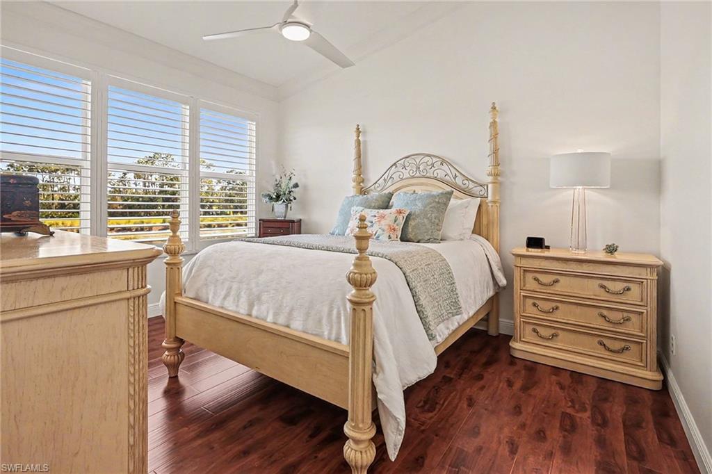 9341 Spring Run Boulevard, Unit 3108 Estero, FL 34135 - Photo 17 of 30 Bedroom with lofted ceiling, a ceiling fan, and dark wood-type flooring