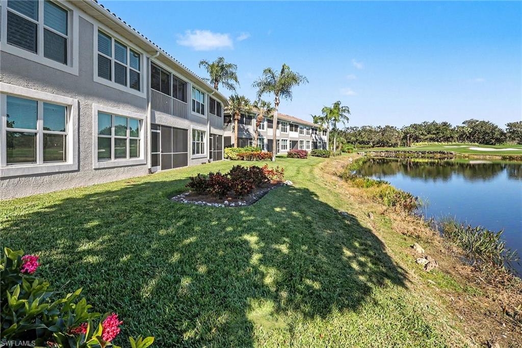 9341 Spring Run Boulevard, Unit 3108 Estero, FL 34135 - Photo 25 of 30 Rear of Structure featuring a water view