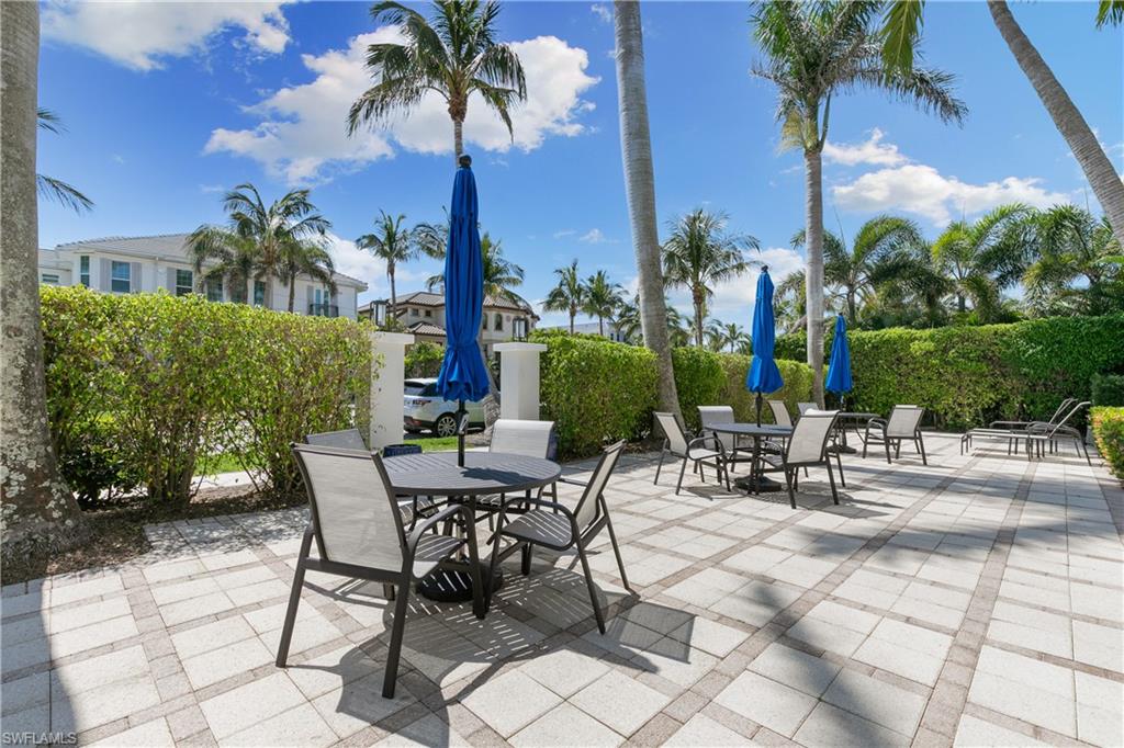 175 5th Avenue South, Unit 3 Naples, FL 34102 - Photo 26 of 31 a view of a backyard with sitting area