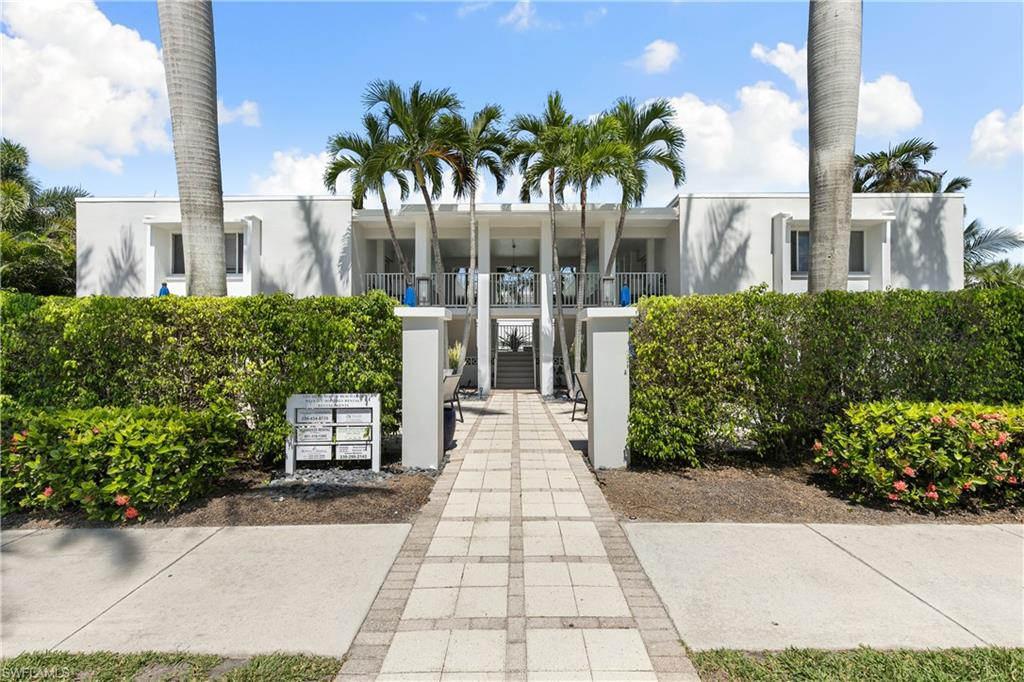 175 5th Avenue South, Unit 3 Naples, FL 34102 - Photo 28 of 31 a view of a pathway with a flower garden