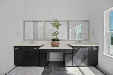 a view of kitchen island sink and stove