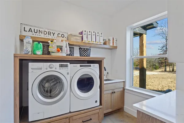 a utility room with dryer and washer