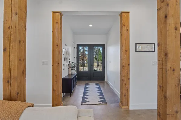 a bathroom with a tub and shower