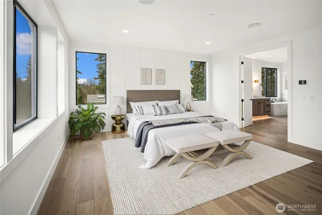 a bathroom with a double vanity sink and mirror