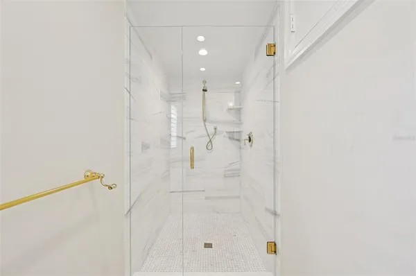 a bedroom with a bed and dresser