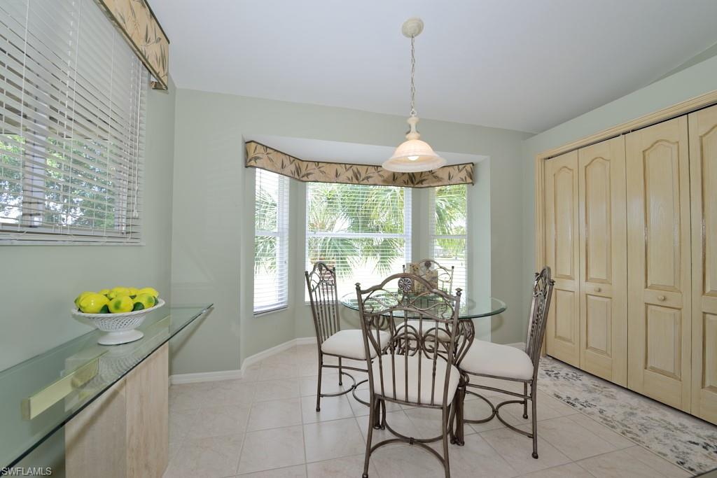 21370 Lancaster Run, Unit 1622 Estero, FL 33928 - Photo 6 of 28 a view of a dining room with furniture window and outside view