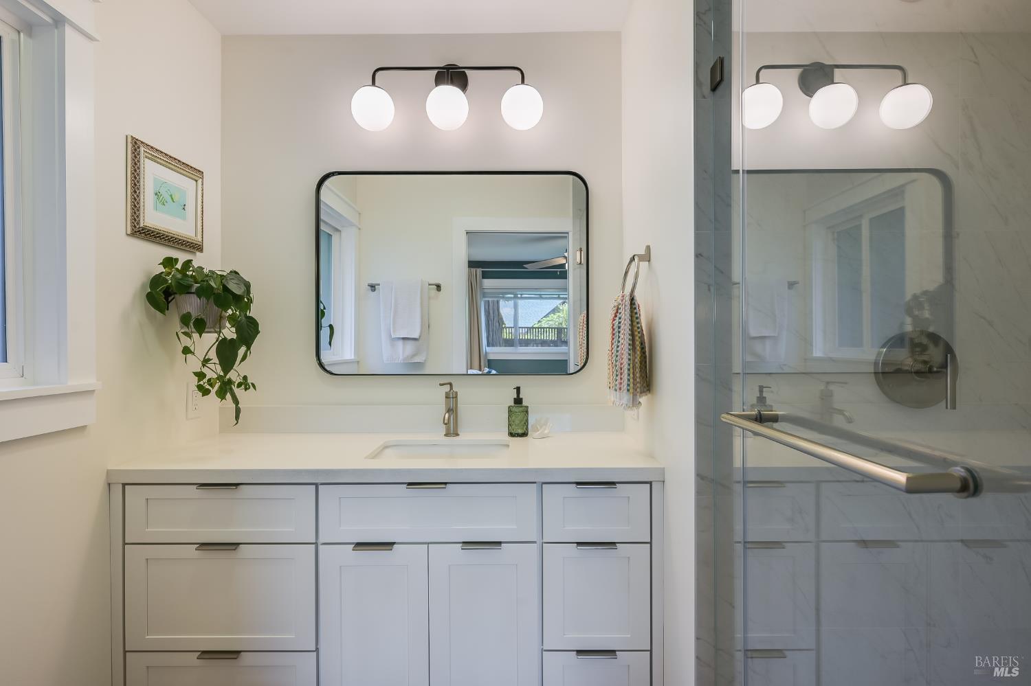2009 Hidden Valley Drive Santa Rosa, CA 95404 - Photo 13 of 26 a bathroom with a sink and a mirror