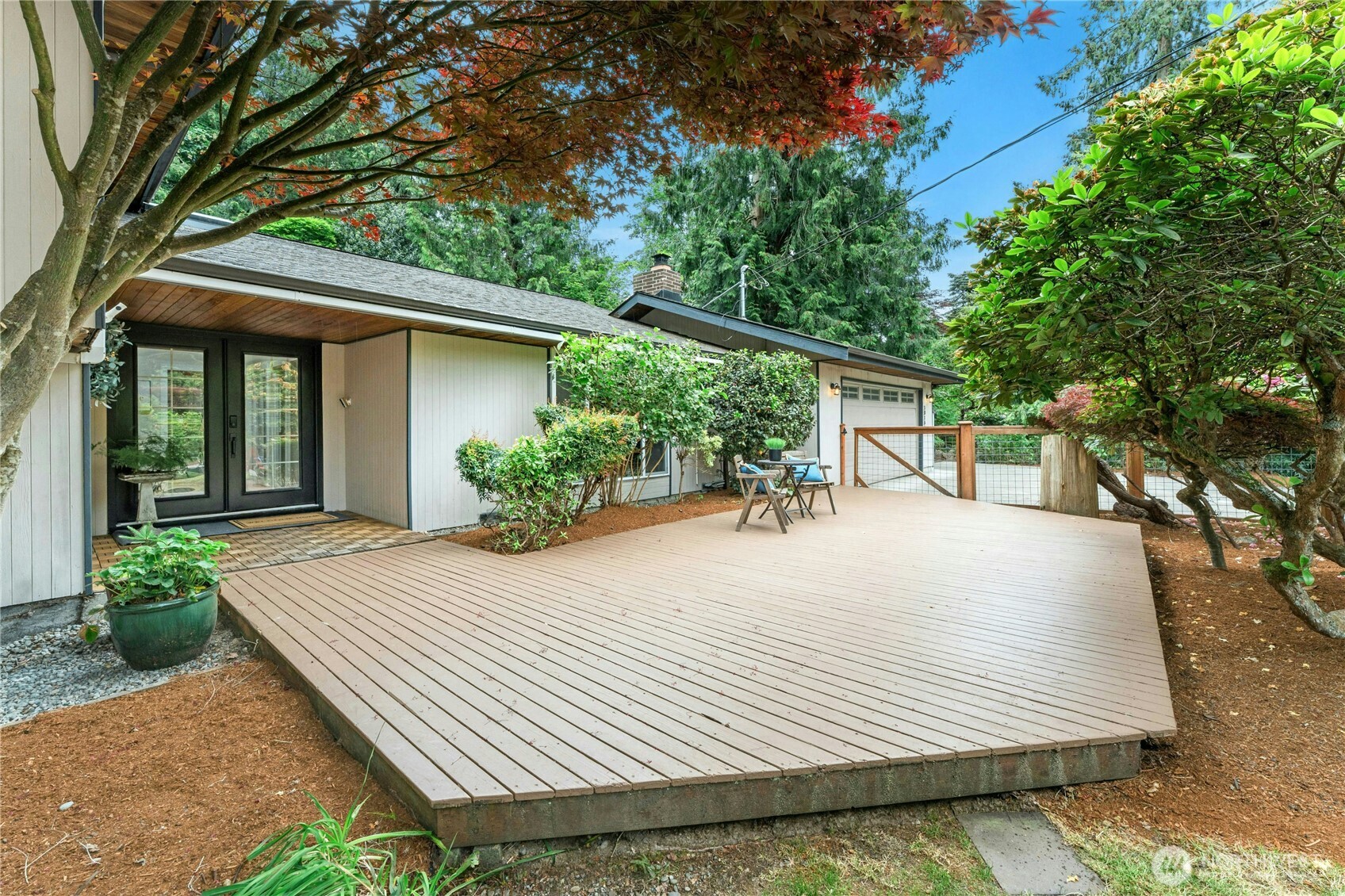 18152 145th Avenue Southeast Renton, WA 98058 - Photo 2 of 40 a house with trees in front of it