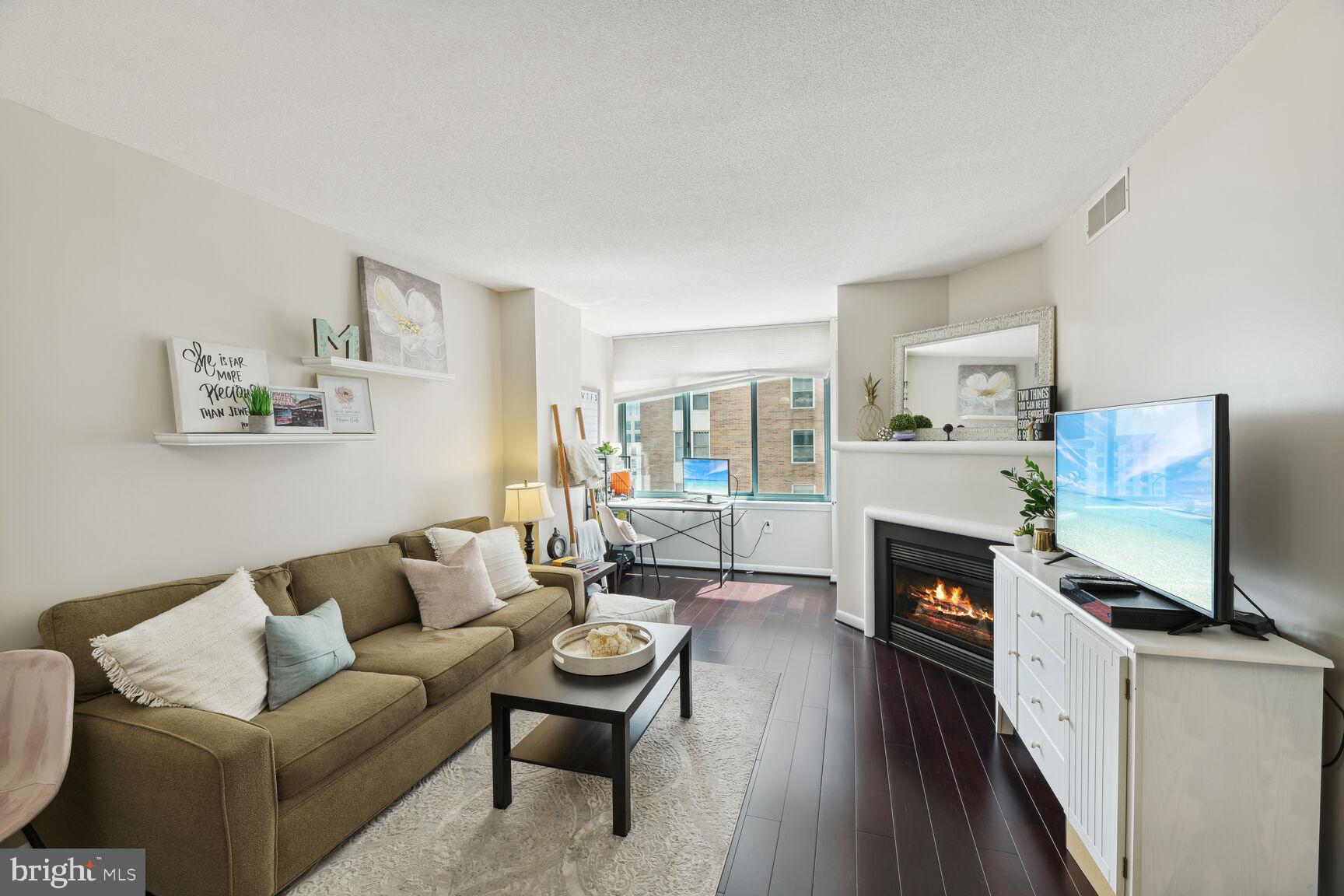 851 North Glebe Road, Unit 1607 Arlington, VA 22203 - Photo 22 of 23 Open floor plan with cozy fireplace!
