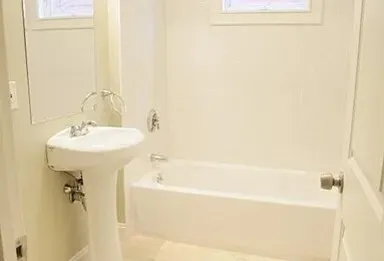 a bathroom with a sink a shower