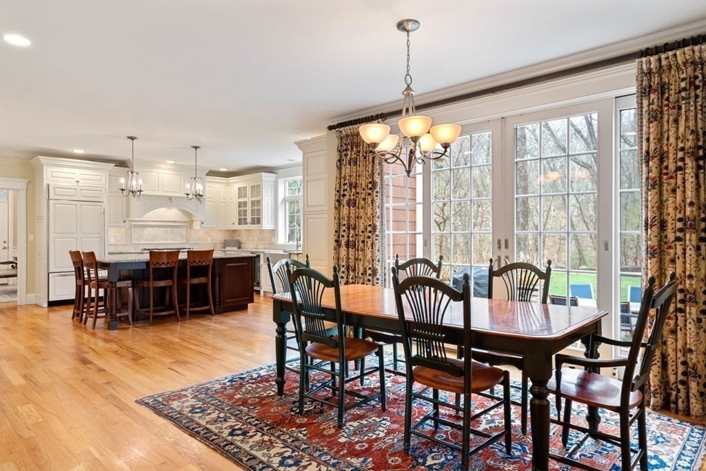 81 Pine Street Dover, MA 02030 - Photo 13 of 40 a dining room with furniture mountain view and a rug
